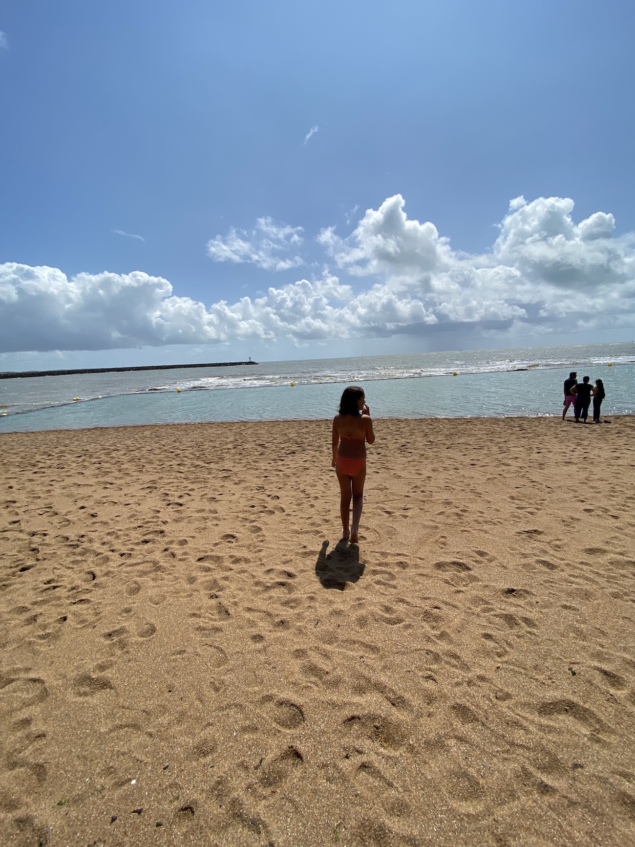 child on the beach at Boisvinet Beach