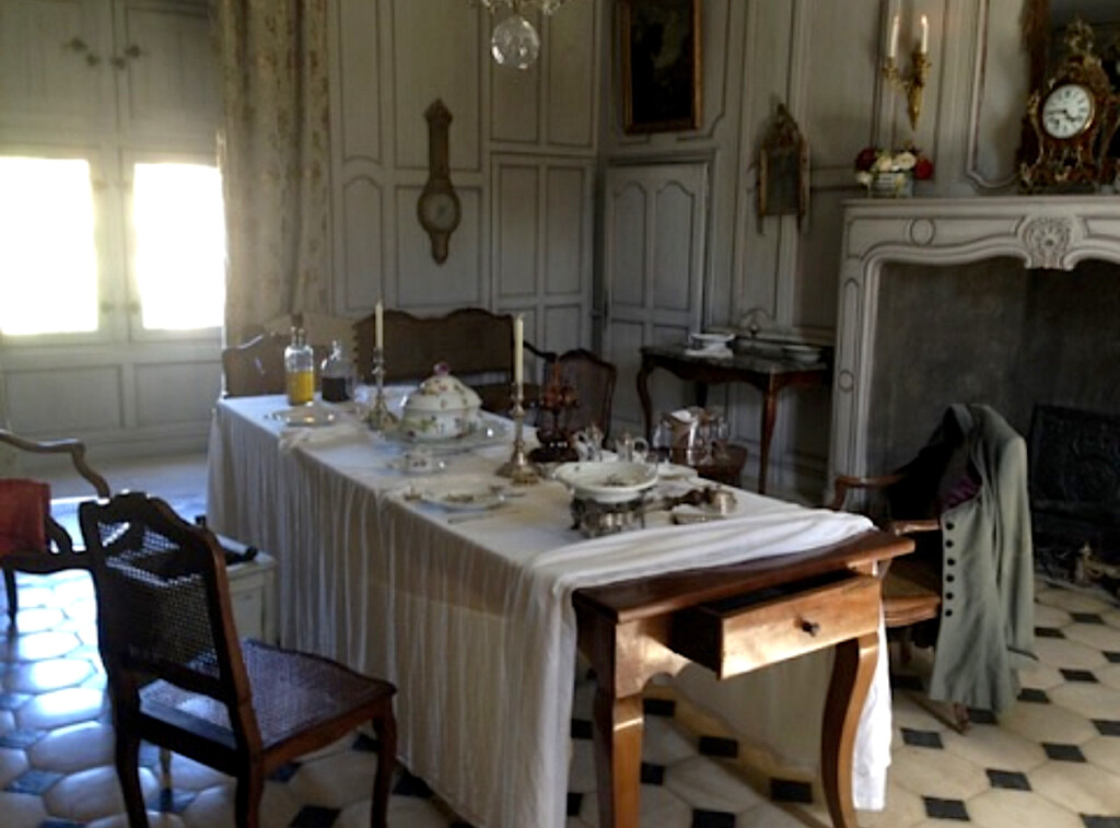 an elegant dinning room in a French Chateau