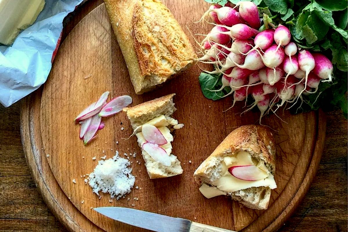 Radishes, Butter and Bread on a board